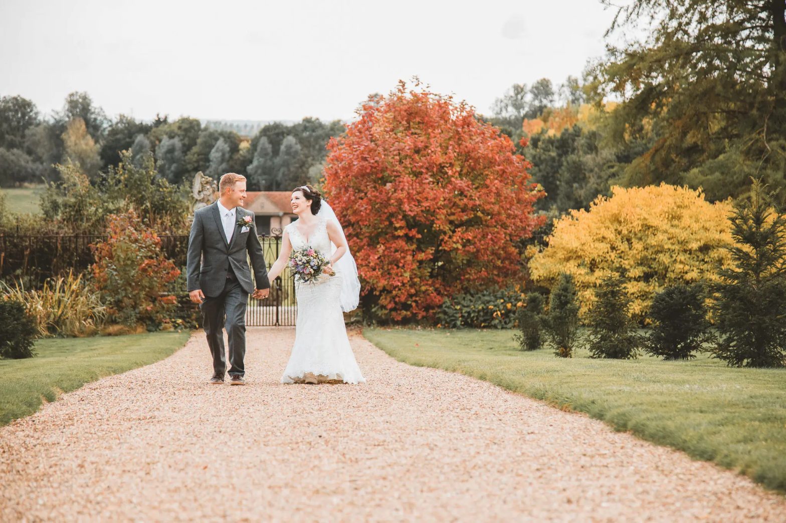 Wedding photographer capturing a natural moment between a bride and groom in Essex